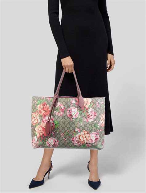 large gucci blooms tote|Gucci blooms key pouch.